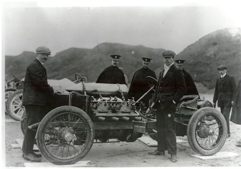 Algenon Lee Guinness standing in front of his new Darracq 200